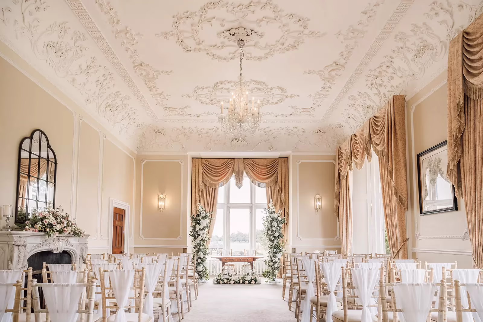 Indoor wedding ceremony seating at Wivenhoe House