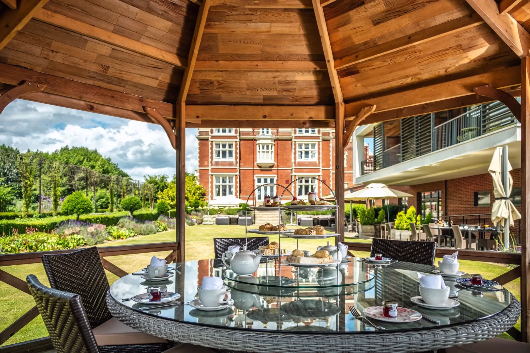 Afternoon tea place setting outside the front of Wivenhoe House